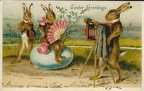Lapin photographe : « Easter Greetings », lapins assis sur un œuf(CAP0484)
