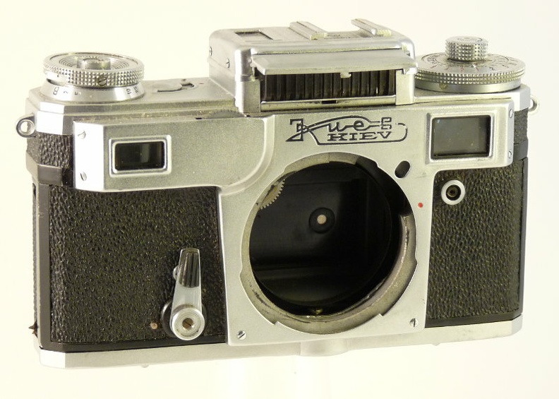 Nom : Kiev 4 (type 2)
Marque : ARSENALFabricant : XXX
Publicité : XXX
Pays : XXX
Date de début : 0Date de fin : 0
Type : compact 24 x 36 à objectif interchangeable (CIFH)
Dimensions, fermé : XXXOuvert : XXX
Poids : XXX
Matière : XXXCouleur : XXX
Surf. sensible : XXXFormat : XXX
Objectif :
- Nom : XXXType : XXX
- Marque : XXX
- Ouverture : XXXFocale : XXX
- Fixation : XXXMonture : XXX
Diaphragme :
- Type : XXX
- Ouverture : XXX
Obturateur :
- Nom : rideauType : XXX
- Marque : XXX
- Vitesses : XXXPose : XXX
- Retardateur : XXX
- Armement : XXX
Film, plaque :
- Compte-vues 1 : XXXCompte-vues 2 : XXX
- Protection 2 expos : XXX
- Avancement : XXX
Flash :
- Synchro : XXX
- Flash interne : XXX
Posemètre :
- Type : XXX
- Plage : XXX
- Automatisme : XXX
Mise au point :
- Type : XXXMinimum : XXX
- Télémètre : XXX
Viseurs :
- Viseur 1 : XXX
- Viseur 2 : XXX
- Viseur 3 : XXX
Autres :
Niveau à bulle : XXX
Porte-acc. 1 : XXXPorte-acc. 2 : -
Écrou de pied : XXX
Déc. vertical : XXXHorizontal : XXX
Bascule avant : XXXArrière : XXX
Commentaires : -
Liens web :-
Appareil présenté :
N° de série : XXX
N° objectif : XXXN° obturateur : XXX
Accessoires : -
Notice : XXX
Commentaires : -
N° inventaire : APP1705_01
APP1705
?, ?
-
Nom: Kiev 4 (type 2)
Marque: ARSENAL; fabricant: ?; publicité: -
Pays: URSS
Date: début: ?1974; fin: ?1980
Type: (CIFH)
Dimensions: ?mm; poids: ?
Matière: ?; Couleur: ?
Surface sensible: ?; format: ?
Objectif: nom: ?; fabricant:?; ouv./focale: ?; fixation : ?
Diaphragme: type: ?; ouvertures: ?
Obturateur: nom: rideau; fabricant: ?; vitesses: ?; pose: ?
Retardateur: ?; Armement: ?
Compte-vues: ?; Protection 2 expos: ?
Synchro flash: ?; flash intégré: ?
Posemètre: type: ?; plage: ?; automatisme: ?
Mise au point: type: ?; mini: ?; télémètre: ?
Décentrement vert.: ?; hor.: ?; bascule avant: ?; arrière: ?
Viseur: ?; Porte-accessoire: ?; Niveau: ?
Mode d'emploi: -
Commentaires:
Appareil présenté
N° de série: -
N° objectif: -; N° obturateur: -
Accessoires: ; sac: -
APP1705_01.jpg