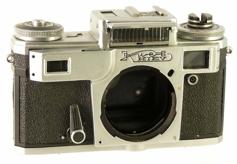 Nom : Kiev 4m
Marque : ARSENALFabricant : XXX
Publicité : XXX
Pays : XXX
Date de début : 0Date de fin : 0
Type : compact 24 x 36 à objectif interchangeable (CIFH)
Dimensions, fermé : XXXOuvert : XXX
Poids : XXX
Matière : XXXCouleur : XXX
Surf. sensible : XXXFormat : XXX
Objectif :
- Nom : XXXType : XXX
- Marque : XXX
- Ouverture : XXXFocale : XXX
- Fixation : XXXMonture : XXX
Diaphragme :
- Type : XXX
- Ouverture : XXX
Obturateur :
- Nom : XXXType : XXX
- Marque : XXX
- Vitesses : XXXPose : XXX
- Retardateur : XXX
- Armement : XXX
Film, plaque :
- Compte-vues 1 : XXXCompte-vues 2 : XXX
- Protection 2 expos : XXX
- Avancement : XXX
Flash :
- Synchro : XXX
- Flash interne : XXX
Posemètre :
- Type : XXX
- Plage : XXX
- Automatisme : XXX
Mise au point :
- Type : XXXMinimum : XXX
- Télémètre : XXX
Viseurs :
- Viseur 1 : XXX
- Viseur 2 : XXX
- Viseur 3 : XXX
Autres :
Niveau à bulle : XXX
Porte-acc. 1 : XXXPorte-acc. 2 : -
Écrou de pied : XXX
Déc. vertical : XXXHorizontal : XXX
Bascule avant : XXXArrière : XXX
Commentaires : -
Liens web :-
Appareil présenté :
N° de série : XXX
N° objectif : XXXN° obturateur : XXX
Accessoires : -
Notice : XXX
Commentaires : -
N° inventaire : APP2407_01
APP2407
?, ?
-
Nom: Kiev 4m
Marque: ARSENAL; fabricant: ?; publicité: -
Pays: URSS
Date: début: ?1977; fin: 1987
Type: (CIFH)
Dimensions: ?mm; poids: ?
Matière: ?; Couleur: ?
Surface sensible: ?; format: ?
Objectif: nom: ?; fabricant:?; ouv./focale: ?; fixation : ?
Diaphragme: type: ?; ouvertures: ?
Obturateur: nom: ?; fabricant: ?; vitesses: ?; pose: ?
Retardateur: ?; Armement: ?
Compte-vues: ?; Protection 2 expos: ?
Synchro flash: ?; flash intégré: ?
Posemètre: type: ?; plage: ?; automatisme: ?
Mise au point: type: ?; mini: ?; télémètre: ?
Décentrement vert.: ?; hor.: ?; bascule avant: ?; arrière: ?
Viseur: ?; Porte-accessoire: ?; Niveau: ?
Mode d'emploi: -
Commentaires:
Marques rouges du sélecteur de vitesse et du compteur de vues différents
Appareil présenté
N° de série: 823684 (1982)
N° objectif: -; N° obturateur: -
Accessoires: ; sac: -
APP2407_01.jpg