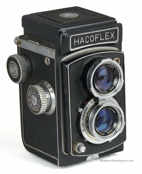 Nom : Hacoflex
Marque : HACOFabricant : XXX
Publicité : -
Pays : Japon
Date de début : ~ 1955Date de fin : 0
Type : réflex bi-objectifs couplés 6 x 6 (BFFMc)
Dimensions, fermé : 95 x 143 x 101 mmOuvert : 95 x 202 x 101 mm
Poids : 913 g
Matière : métal gainéCouleur : noir
Surf. sensible : film 120Format : 6 x 6 cm
Objectif :
- Nom : Tri-LausarType : ?
- Marque : Tomioka
- Ouverture : 3,5Focale : 80 mm
- Fixation : fixeMonture : non interchangeable
Diaphragme :
- Type : iris
- Ouverture : 3,5 à 22
Obturateur :
- Nom : -Type : central
- Marque : -
- Vitesses : 1 s à 1/300 sPose : B
- Retardateur : oui
- Armement : couplé à l'avance du film
Film, plaque :
- Compte-vues 1 : compteur 12 vues
- Protection 2 expos : non
- Avancement : molette
Flash :
- Synchro : X
- Flash interne : non
Posemètre :
- Type : sans
- Plage : -
- Automatisme : manuel
Mise au point :
- Type : déplacement de la platine porte-objectifMinimum : 3,5 ft (1 m)
- Télémètre : réflex TLR
Viseurs :
- Viseur 1 : réflex TLR couplé
- Viseur 2 : sportif (2 cadres)
Autres :
Niveau à bulle : XXX
Porte-acc. 1 : sabot non synchroniséPorte-acc. 2 : -
Écrou de pied : 1/4 "
Déc. vertical : -Horizontal : -
Bascule avant : -Arrière : -
Commentaires : - Version 1 : prise flash en haut, monture baïonnette Rollei pour les filtres, forme de la plaquette métallique de fixation de la courroie.
- Autres versions : prise flash en bas, numéro de série, compteur de vue.
- Voir aussi : Toyocaflex...
Liens web :Sur le site collection-appareils.fr : voir ici
-
Appareil présenté :
N° de série : -
N° objectif : 21696N° obturateur : -
Accessoires : - Sac tout-prêt Haco.
Notice : -
Commentaires :
N° inventaire : APP2704_01
APP2704_01.jpg