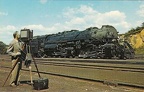 Photographe photographiant une locomotive(CAP0555)