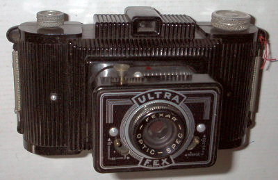 Nom : Ultra-Fex
Marque : FEXFabricant : Fex
Publicité : -
Pays : France
Date de début : 0Date de fin : 0
Type : compact 6 x 9 (CRFO)
Dimensions, fermé : XXXOuvert : XXX
Poids : XXX
Matière : XXXCouleur : XXX
Surf. sensible : film 120Format : 6 x 9 cm
Objectif :
- Nom : Spec FexarType : XXX
- Marque : XXX
- Ouverture : XXXFocale : XXX
- Fixation : XXXMonture : XXX
Diaphragme :
- Type : XXX
- Ouverture : XXX
Obturateur :
- Nom : rotatifType : XXX
- Marque : XXX
- Vitesses : XXXPose : XXX
- Retardateur : XXX
- Armement : XXX
Film, plaque :
- Compte-vues 1 : XXXCompte-vues 2 : XXX
- Protection 2 expos : XXX
- Avancement : XXX
Flash :
- Synchro : XXX
- Flash interne : XXX
Posemètre :
- Type : XXX
- Plage : XXX
- Automatisme : XXX
Mise au point :
- Type : XXXMinimum : XXX
- Télémètre : XXX
Viseurs :
- Viseur 1 : XXX
- Viseur 2 : XXX
- Viseur 3 : XXX
Autres :
Niveau à bulle : XXX
Porte-acc. 1 : XXXPorte-acc. 2 : -
Écrou de pied : XXX
Déc. vertical : XXXHorizontal : XXX
Bascule avant : XXXArrière : XXX
Commentaires : -
Liens web :-
Appareil présenté :
N° de série : XXX
N° objectif : XXXN° obturateur : XXX
Accessoires : -
Notice : XXX
Commentaires : Photos prises avec cet appareil:
(film Isopan 21, Orléans, 1979)
N° inventaire : APP0029
Nom: Ultra-Fex (FEX,15-16)
Marque: FEX; fabricant: -; publicité: -
Pays: France
Date: début: ?1950; fin: ??
Type: (CRFO)
Dimensions: 155x90x70;155x90x95mm; poids: ?
Matière: bakélite; Couleur: noir
Surface sensible: film 120; format: 6x9cm
Objectif: nom: Spec Fexar; fabricant:?; ouv./focale: f11/70; fixation : coulissant
Diaphragme: type: rotatif; ouvertures: f11,f16
Obturateur: nom: rotatif; fabricant: ?; vitesses: 1/25,1/100; pose: B
Retardateur: -; Armement: -
Compte-vues: fenêtre; Protection 2 expos: -
Synchro flash: -; flash intégré: -
Posemètre: type: ?; plage: -; automatisme: manuel
Mise au point: type: fixe; mini: 1,5m; télémètre: -
Décentrement vert.: -; hor.: -; bascule avant: -; arrière: -
Viseur: galilee; Porte-accessoire: -; Niveau: -
Mode d'emploi: -
Commentaires:
-
Appareil présenté
N° de série: -
N° objectif: -; N° obturateur: ?
Accessoires: -; sac: tout prêt
APP0029.jpg