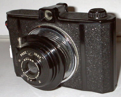 Nom : Miom 6x9
Marque : MIOMFabricant : XXX
Publicité : XXX
Pays : XXX
Date de début : 0Date de fin : 0
Type : compact 6 x 9 (CVFO)
Dimensions, fermé : XXXOuvert : XXX
Poids : XXX
Matière : XXXCouleur : XXX
Surf. sensible : film 620Format : 6 x 9 cm
Objectif :
- Nom : Serie VIIType : XXX
- Marque : XXX
- Ouverture : XXXFocale : XXX
- Fixation : XXXMonture : XXX
Diaphragme :
- Type : XXX
- Ouverture : XXX
Obturateur :
- Nom : rotatifType : XXX
- Marque : XXX
- Vitesses : XXXPose : XXX
- Retardateur : XXX
- Armement : XXX
Film, plaque :
- Compte-vues 1 : XXXCompte-vues 2 : XXX
- Protection 2 expos : XXX
- Avancement : XXX
Flash :
- Synchro : XXX
- Flash interne : XXX
Posemètre :
- Type : XXX
- Plage : XXX
- Automatisme : XXX
Mise au point :
- Type : XXXMinimum : XXX
- Télémètre : XXX
Viseurs :
- Viseur 1 : XXX
- Viseur 2 : XXX
- Viseur 3 : XXX
Autres :
Niveau à bulle : XXX
Porte-acc. 1 : XXXPorte-acc. 2 : -
Écrou de pied : XXX
Déc. vertical : XXXHorizontal : XXX
Bascule avant : XXXArrière : XXX
Commentaires : -
Liens web :-
Appareil présenté :
N° de série : XXX
N° objectif : XXXN° obturateur : XXX
Accessoires : -
Notice : XXX
Commentaires : -
N° inventaire : APP0359
Nom: Miom 6x9
Marque: MIOM; fabricant: -; publicité: -
Pays: France
Date: début: -1936; fin: ?1938
Type: (CVFO)
Dimensions: 170x110x75;170x110x95mm; poids: 520
Matière: bakélite; Couleur: noir
Surface sensible: film 620; format: 6x9cm
Objectif: nom: Serie VII; fabricant:Boyer; ouv./focale: f?/?; fixation : rentrant à vis
Diaphragme: type: rotatif; ouvertures: (2 ouv.)
Obturateur: nom: rotatif; fabricant: Gauthier; vitesses: 1 vit.; pose: B
Retardateur: -; Armement: -
Compte-vues: fenêtre; Protection 2 expos: -
Synchro flash: -; flash intégré: -
Posemètre: type: -; plage: -; automatisme: manuel
Mise au point: type: fixe; mini: 2,75m; télémètre: -
Décentrement vert.: -; hor.: -; bascule avant: -; arrière: -
Viseur: galilee; Porte-accessoire: -; Niveau: -
Mode d'emploi: -
Commentaires:
1 seul format
voir Photax 6x9
Par rapport au Photax 6x9: trou 2 bouché; indications intérieures pour les 2 formats grattées; Photax à l'avant et à l'arrière ont disparu
Appareil présenté
N° de série: -
N° objectif: -; N° obturateur: -
Accessoires: -; sac: -
APP0359.jpg