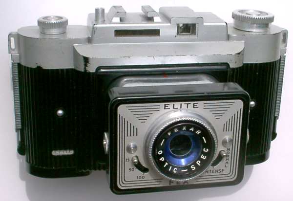 Nom : Elite (FEX,39x)
Marque : FEXFabricant : XXX
Publicité : XXX
Pays : XXX
Date de début : 0Date de fin : 0
Type : compact 6 x 9 (CRFO)
Dimensions, fermé : XXXOuvert : XXX
Poids : XXX
Matière : XXXCouleur : XXX
Surf. sensible : film 620Format : 6 x 9 cm
Objectif :
- Nom : Spec FexarType : XXX
- Marque : XXX
- Ouverture : XXXFocale : XXX
- Fixation : XXXMonture : XXX
Diaphragme :
- Type : XXX
- Ouverture : XXX
Obturateur :
- Nom : rotatifType : XXX
- Marque : XXX
- Vitesses : XXXPose : XXX
- Retardateur : XXX
- Armement : XXX
Film, plaque :
- Compte-vues 1 : XXXCompte-vues 2 : XXX
- Protection 2 expos : XXX
- Avancement : XXX
Flash :
- Synchro : XXX
- Flash interne : XXX
Posemètre :
- Type : XXX
- Plage : XXX
- Automatisme : XXX
Mise au point :
- Type : XXXMinimum : XXX
- Télémètre : XXX
Viseurs :
- Viseur 1 : XXX
- Viseur 2 : XXX
- Viseur 3 : XXX
Autres :
Niveau à bulle : XXX
Porte-acc. 1 : XXXPorte-acc. 2 : -
Écrou de pied : XXX
Déc. vertical : XXXHorizontal : XXX
Bascule avant : XXXArrière : XXX
Commentaires : -
Liens web :-
Appareil présenté :
N° de série : XXX
N° objectif : XXXN° obturateur : XXX
Accessoires : -
Notice : XXX
Commentaires : -
N° inventaire : APP1503
APP1503
Spec Fexar, f11/70
rotatif, 1/25,1/50,1/100
-
Nom: Elite (FEX,39x)
Marque: FEX; fabricant: -; publicité: -
Pays: France
Date: début: ?1960; fin: ?1960
Type: (CRFO)
Dimensions: 155x90x75;155x95x95mm; poids: 380
Matière: bakélite; Couleur: noir/gris
Surface sensible: film 620; format: 6x9;6x6cm(cache amovible)
Objectif: nom: Spec Fexar; fabricant:?; ouv./focale: f11/70; fixation : coulissant
Diaphragme: type: coulissant; ouvertures: f11,f16
Obturateur: nom: rotatif; fabricant: ?; vitesses: 1/25,1/50,1/100; pose: -
Retardateur: -; Armement: -
Compte-vues: fenêtre (x2); Protection 2 expos: -
Synchro flash: X; flash intégré: -
Posemètre: type: optique; plage: ?; automatisme: manuel
Mise au point: type: fixe; mini: 1,5m; télémètre: -
Décentrement vert.: -; hor.: -; bascule avant: -; arrière: -
Viseur: galilee (ocul. rond); Porte-accessoire: sabot; Niveau: -
Mode d'emploi: MAN0407
Commentaires:
déclencheur sur boîtier; angles vifs
3 vit. sans pose
petit viseur; petit posemètre
Appareil présenté
N° de série: -
N° objectif: -; N° obturateur: -
Accessoires: -; sac: tout prêt
APP1503.jpg