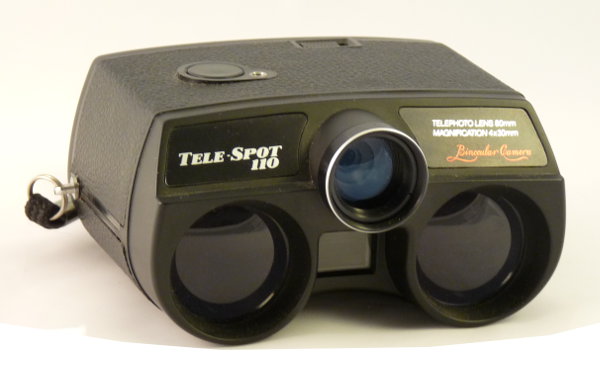 Cet appareil photographique est une combinaison d'un appareil avec une focale de 80 mm et d'une paire de jumelles 4 x 30 mm. Il a été également vendu aux États-Unis sous les noms de Rand Photo Binocular 110 et de ITT IC407.
Nom : Tele Spot
Marque : XXXFabricant : Sedic
Publicité : -
Pays : Japon
Date de début : c. 1979Date de fin : 9999
Type : miniature 110 camouflé (EFFC)
Dimensions, fermé : XXXOuvert : XXX
Poids : XXX
Matière : XXXCouleur : XXX
Surf. sensible : cassette 110Format : 13 x 17 mm
Objectif :
- Nom : TelephotoType : XXX
- Marque : XXX
- Ouverture : 11Focale : 80 mm
- Fixation : fixeMonture : non interchangeable
Diaphragme :
- Type : XXX
- Ouverture : XXX
Obturateur :
- Nom : XXXType : XXX
- Marque : XXX
- Vitesses : 1/125 sPose : non
- Retardateur : non
- Armement : XXX
Film, plaque :
- Compte-vues 1 : fenêtre transparente
- Protection 2 expos : oui
- Avancement : XXX
Flash :
- Synchro : non
- Flash interne : non
Posemètre :
- Type : sans
- Plage : -
- Automatisme : manuel
Mise au point :
- Type : XXXMinimum : XXX
- Télémètre : non
Viseurs :
- Viseur 1 : XXX
Autres :
Niveau à bulle : non
Porte-acc. 1 : XXXPorte-acc. 2 : -
Écrou de pied : XXX
Déc. vertical : -Horizontal : -
Bascule avant : -Arrière : -
Commentaires : -
Liens web :Sur subclub.org : voir ici.
Appareil présenté :
N° de série : -
N° objectif : -N° obturateur : -
Accessoires : -
Notice : -
Commentaires : -
N° inventaire : APP2279_01
APP2279_01.jpg